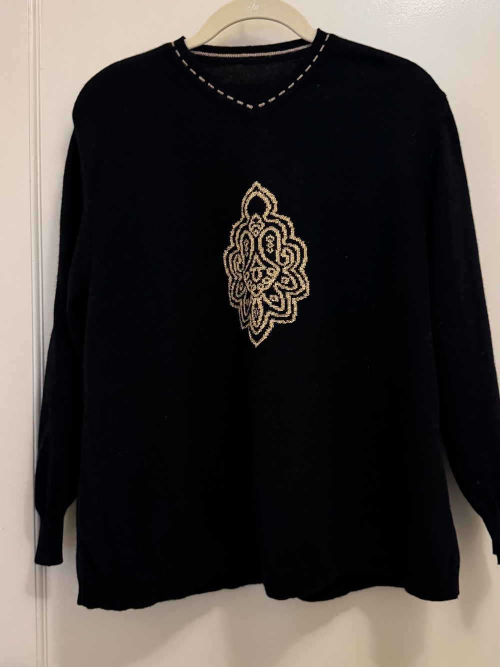 Black Knit Women's Sweater with Gold Embroidered Medallion
